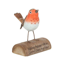 Resin robin ornament with orange and white body on carved wood log base