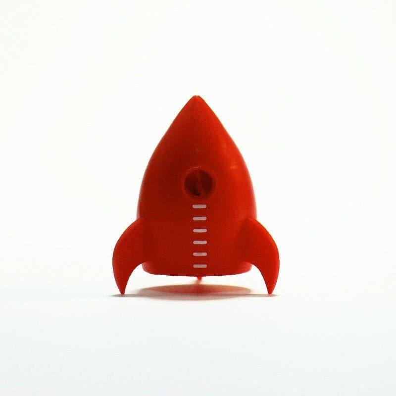 Red rocket pencil sharpener front view with sharpening hole and measuring lines on the body.