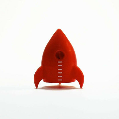 Red rocket pencil sharpener front view with sharpening hole and measuring lines on the body.