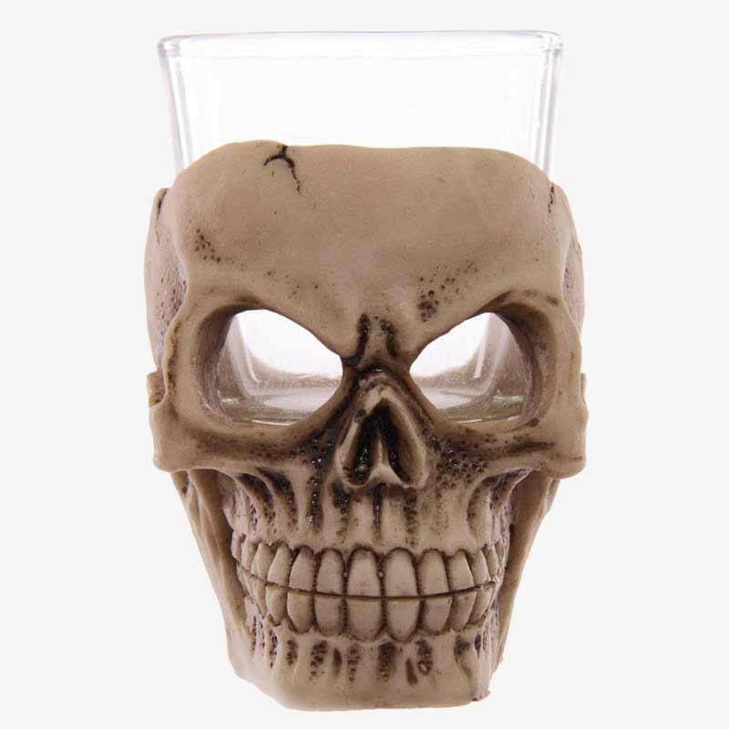Skull mini shot glass with clear cup and tan skull face, open mouth detail