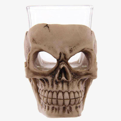 Skull mini shot glass with clear cup and tan skull face, open mouth detail