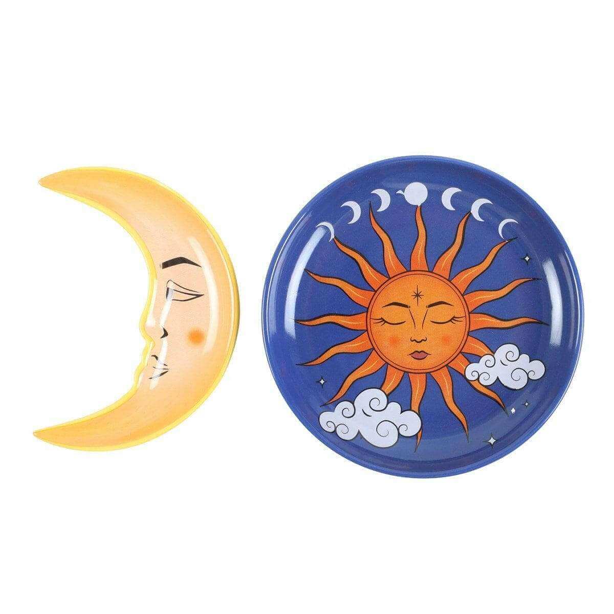 Round celestial trinket dish detail with sun face and crescent moon on blue and yellow