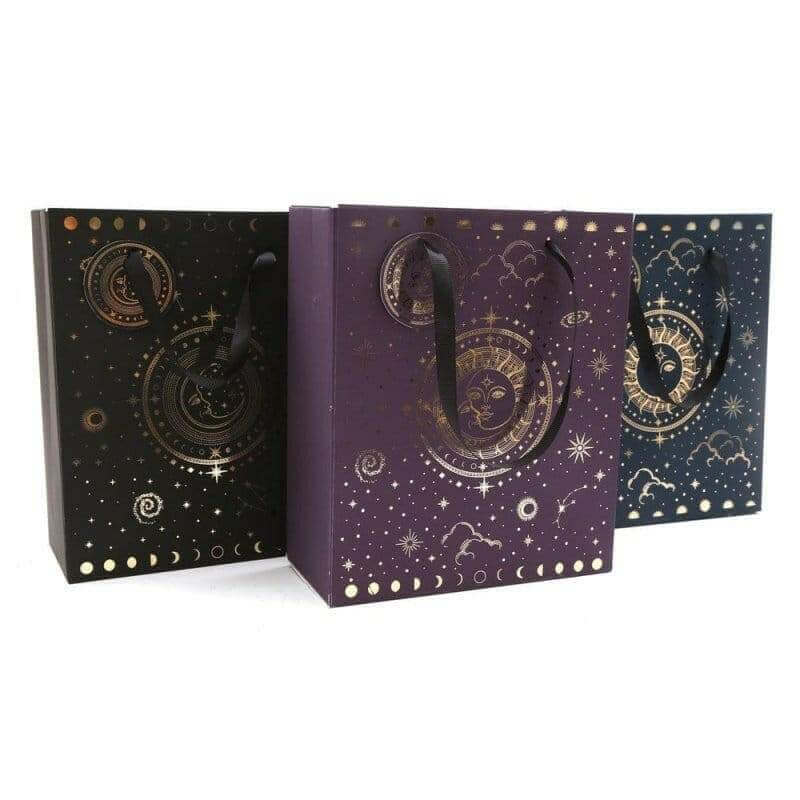 Moon and star print gift bags in black, purple, and blue, shown from front angles.