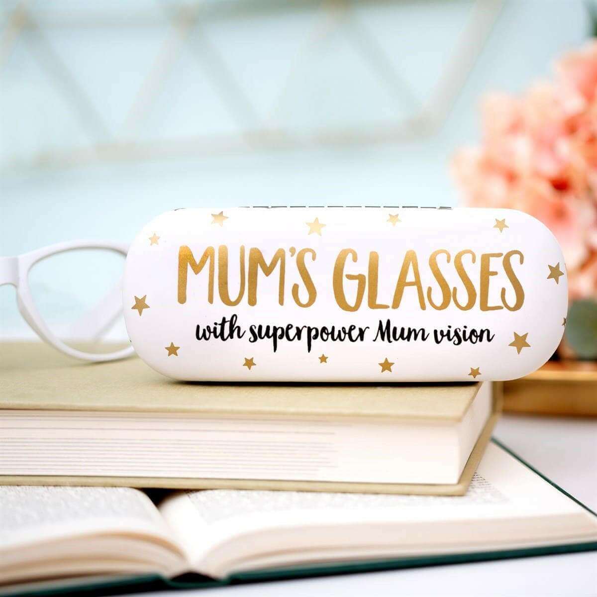 White glasses case with visible glasses frames, gold "MUM'S GLASSES" lettering