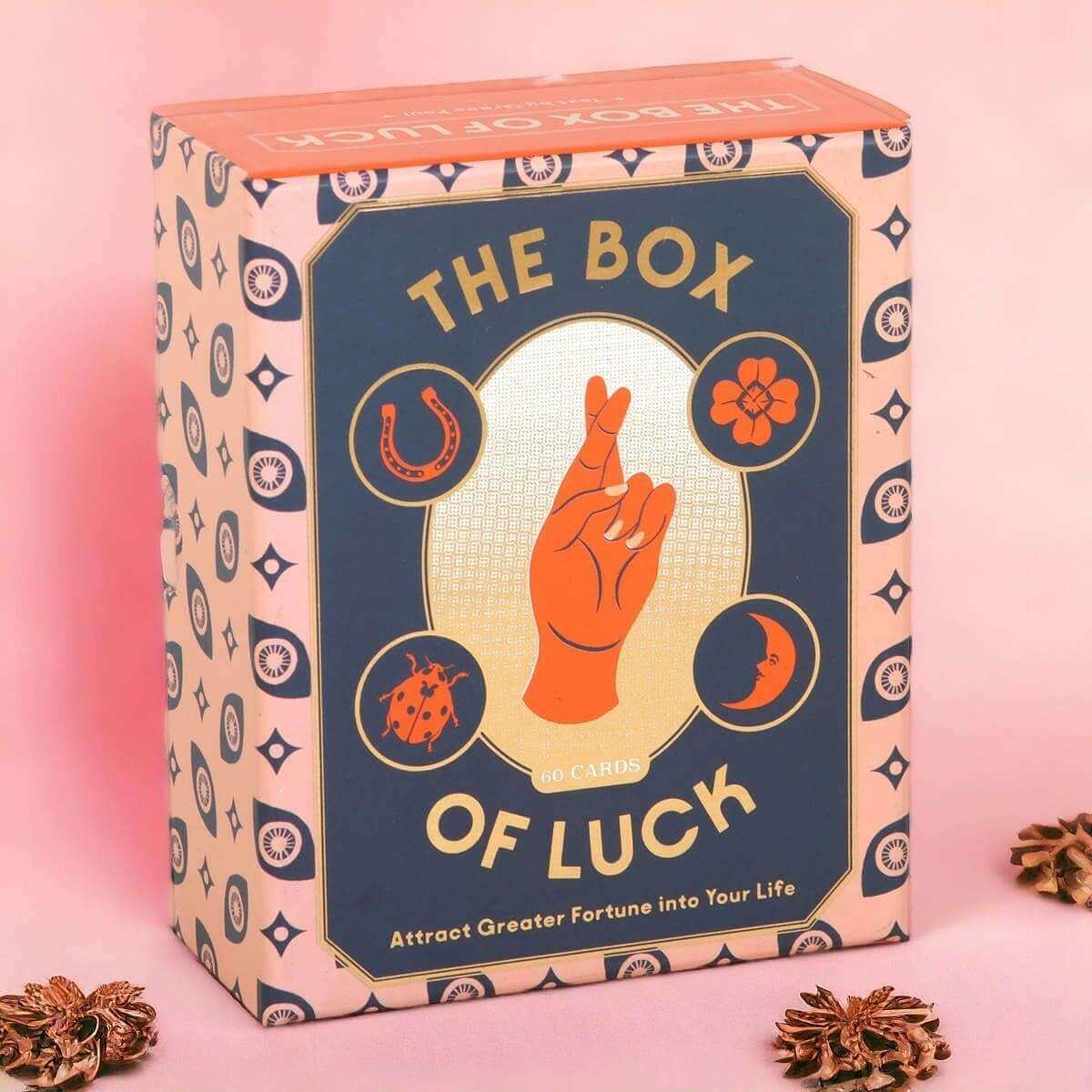 The Box of Luck tarot card box with patterned sides and orange top lid