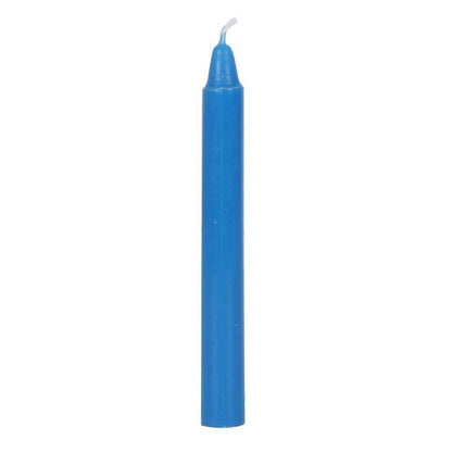 Blue pillar candle with a visible wick top