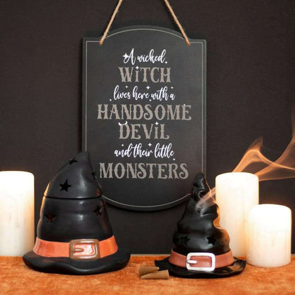 Black hanging witch quote sign with twine hanger loop