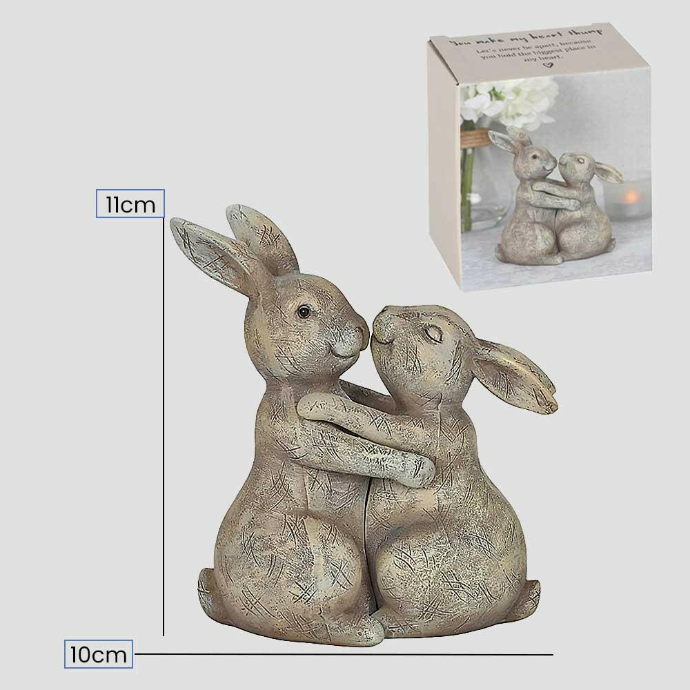 Beige bunny rabbit ornament pair hugging, product packaging with size markings shown